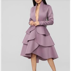 Scuba midi dress in the color mauve.